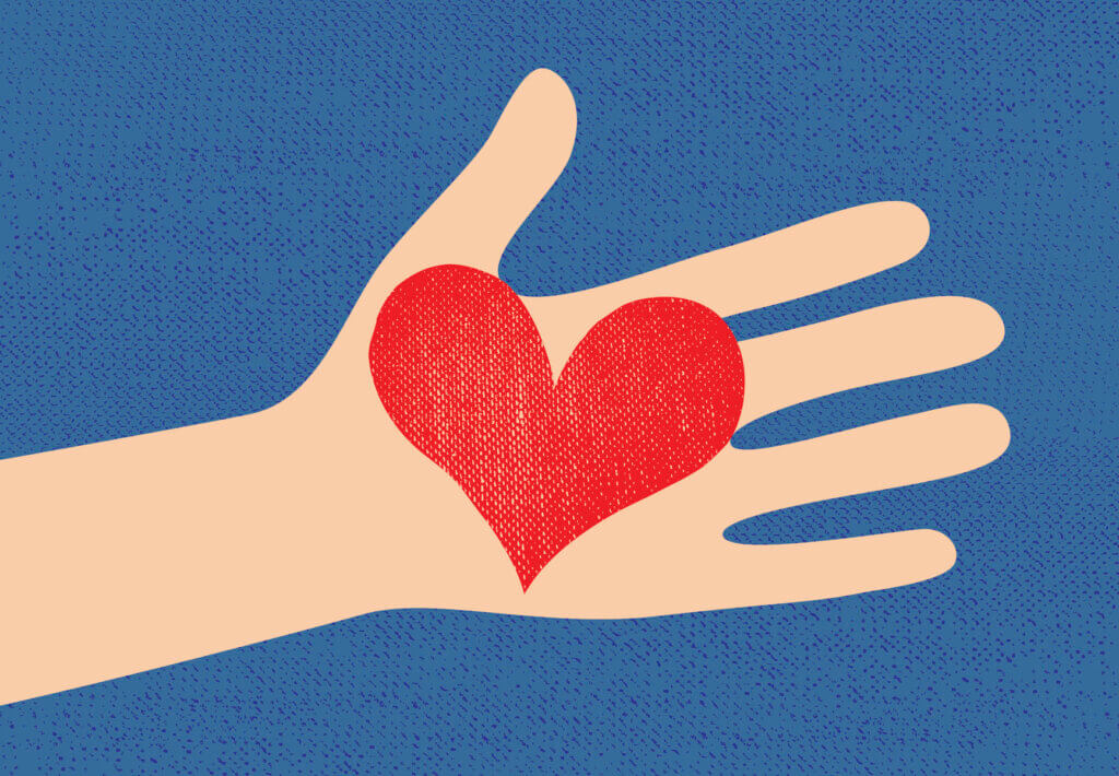 love red heart in hand to woman