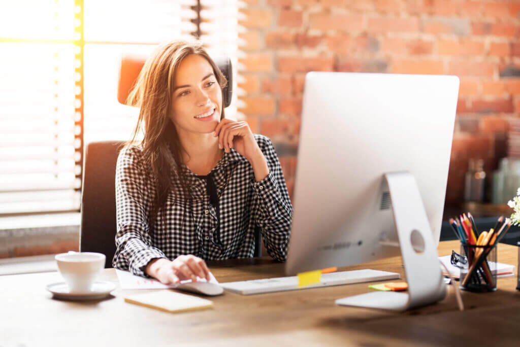 Woman working with computer at office